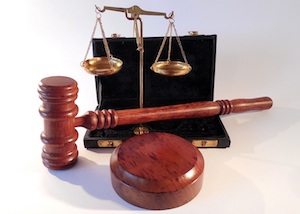 Other Crimes Attorney in Los Angeles County Overhead View of a Gavel and Scale of Justice Sitting on a Desk